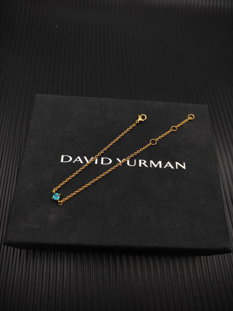 David Yurman Elegant Gold Bracelet with Blue Gemstone